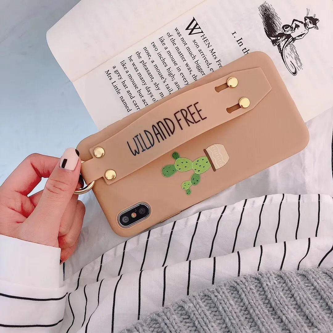 Green iPhone case with a detachable wristband and graffiti print on the back.