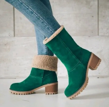 Women's mid-calf suede snow boot with thick heel on a waterproof platform.