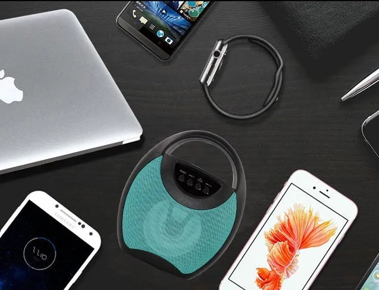 Portable Bluetooth speaker in black, blue or pink with USB port for charging