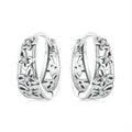 Retro hollow butterfly sterling silver earrings with zircon detail, showing 14mm height.