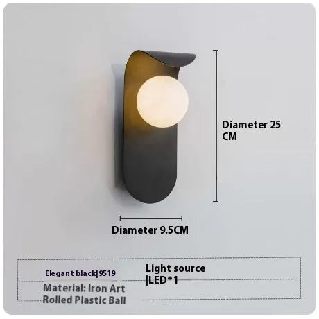 Modern minimalist black iron wall lamp with LED light for bedside or living room wall