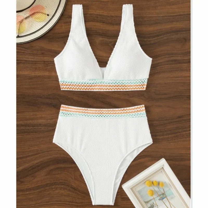 High waist solid colour bikini swimsuit in nylon, shown in pink or white.