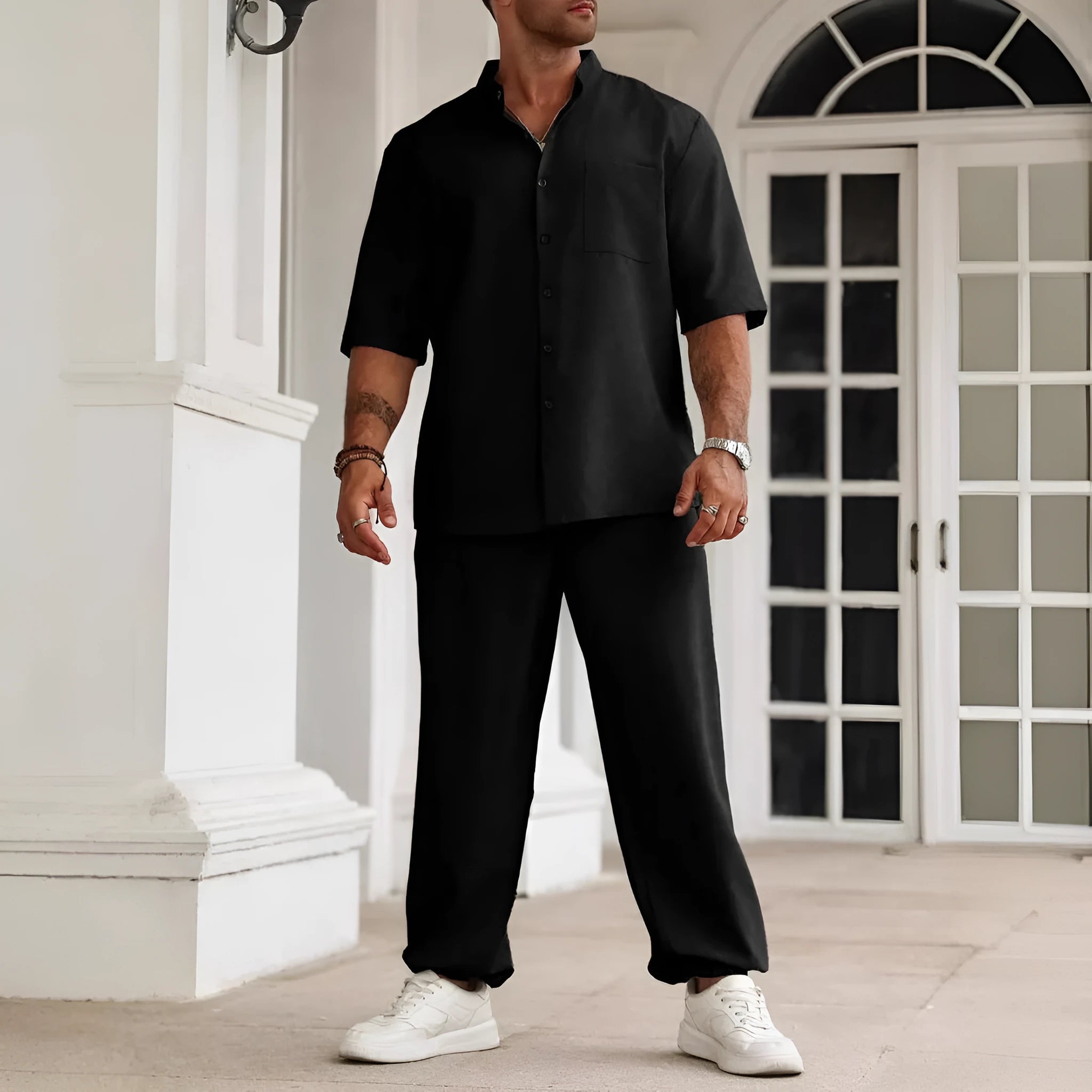 Men's apricot coloured cotton linen casual short-sleeve shirt and long trousers set laid flat