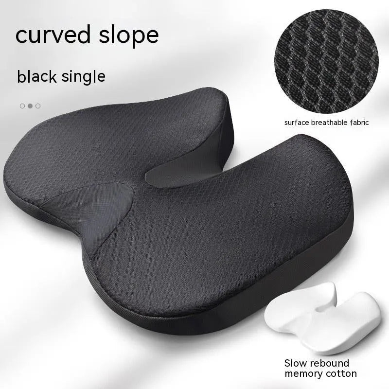 Curved bevel memory foam seat cushion for tailbone support in beige colour on a car seat.