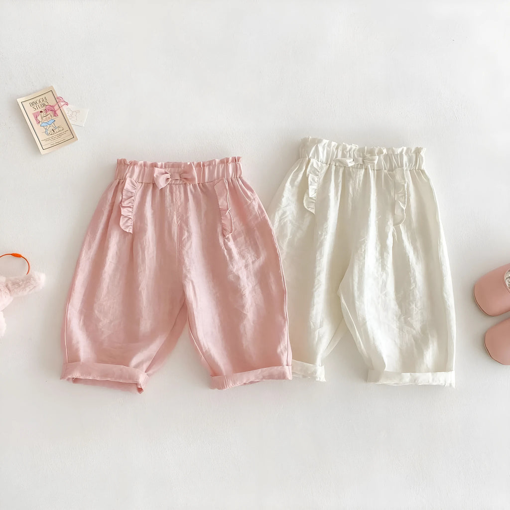 Girls' bow anti mosquito pants in cotton, solid colour, mid waist, available in rubber pink and cream beige, heights 73-120cm.