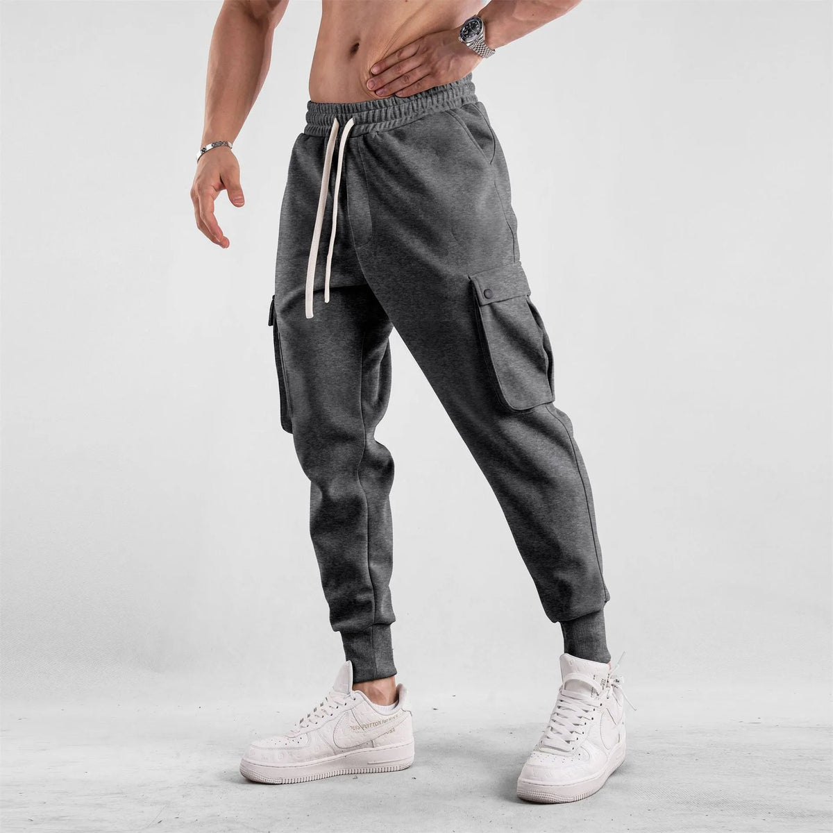 Men's loose cotton sports trousers with ankle ties and multiple pockets in various colours
