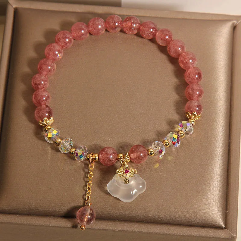 Women's natural crystal bracelet with strawberry quartz and white agate beads featuring auspicious cloud design