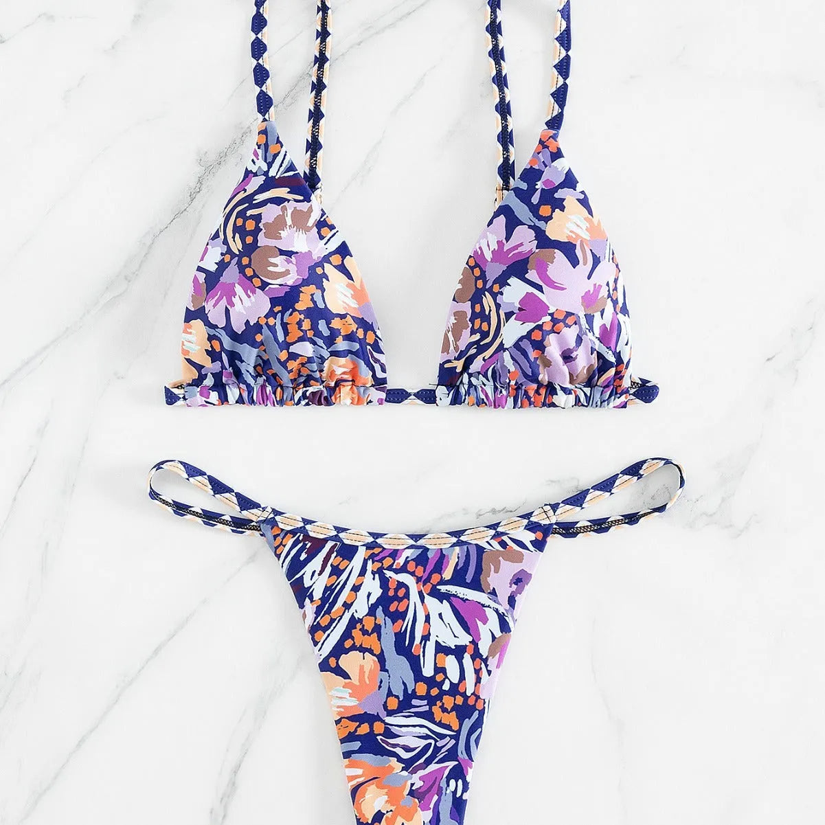Women's floral print triangle top bikini with briefs bottom on a mannequin