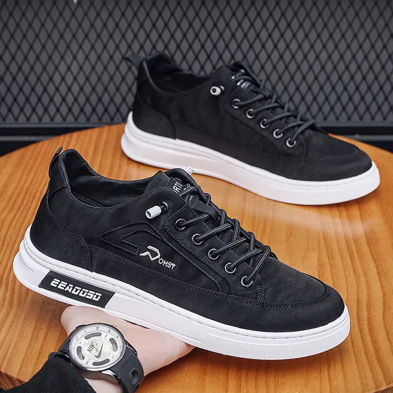 Grey men's casual canvas shoes with round toe and lace-up design featuring breathable construction
