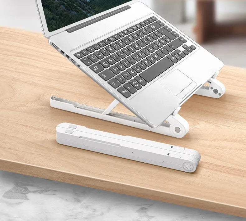 Black ABS folding laptop stand on desk with laptop placed on top