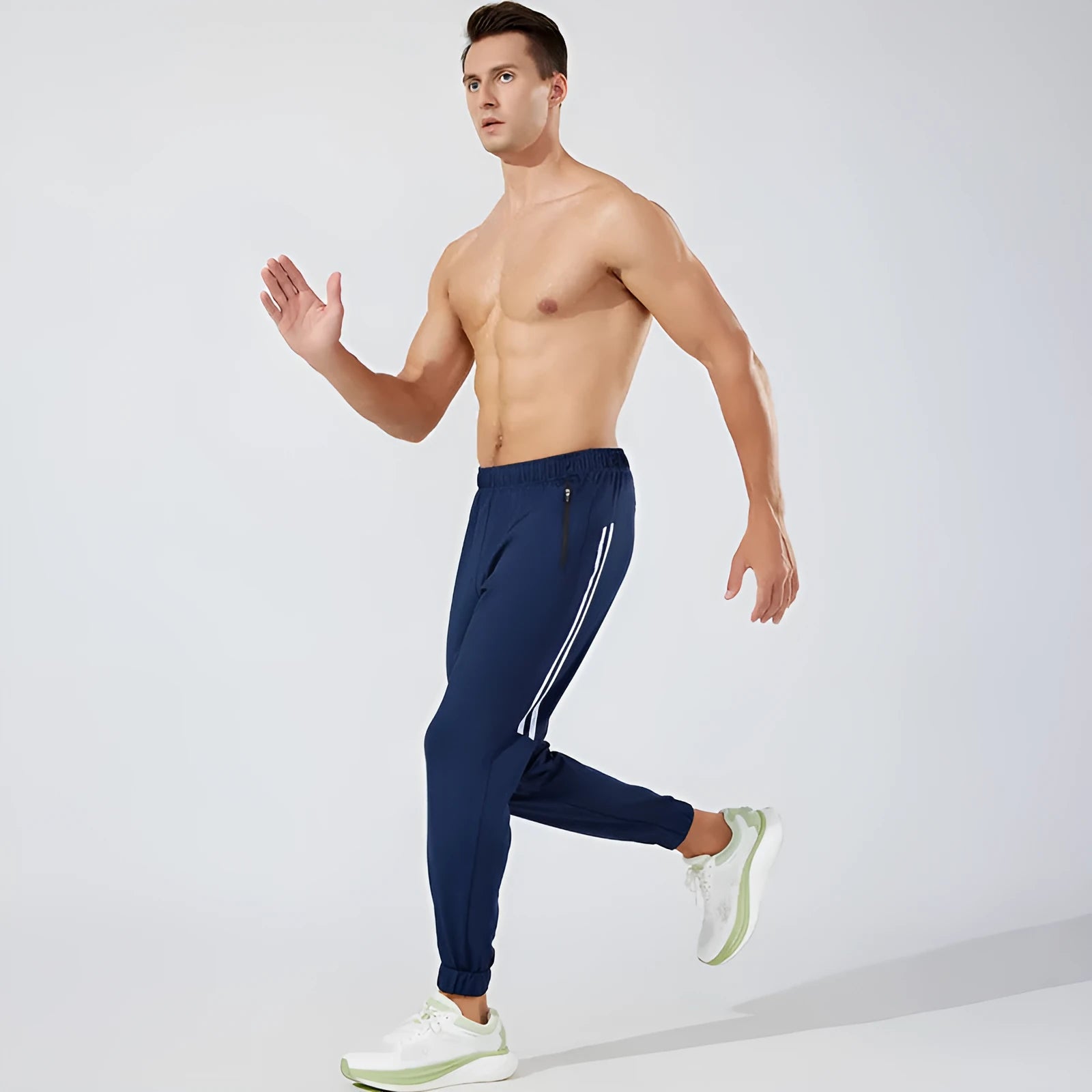 Men's black polyester sports trousers with mid waist design for running and exercise