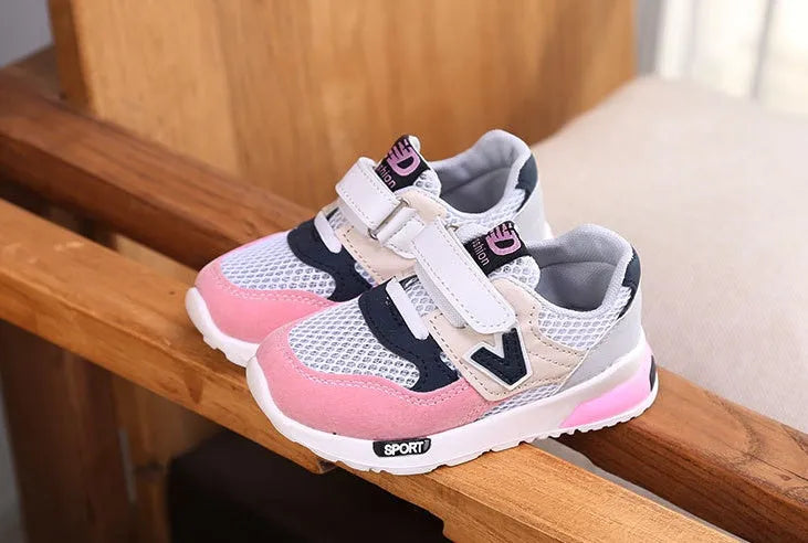 Girls running shoes with breathable mesh upper and TPR sole in grey colour