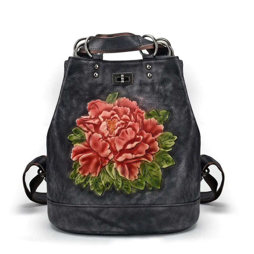 Women's retro leather bucket backpack in first layer cowhide, 25.5x30x15.5cm, with drawstring and double straps.