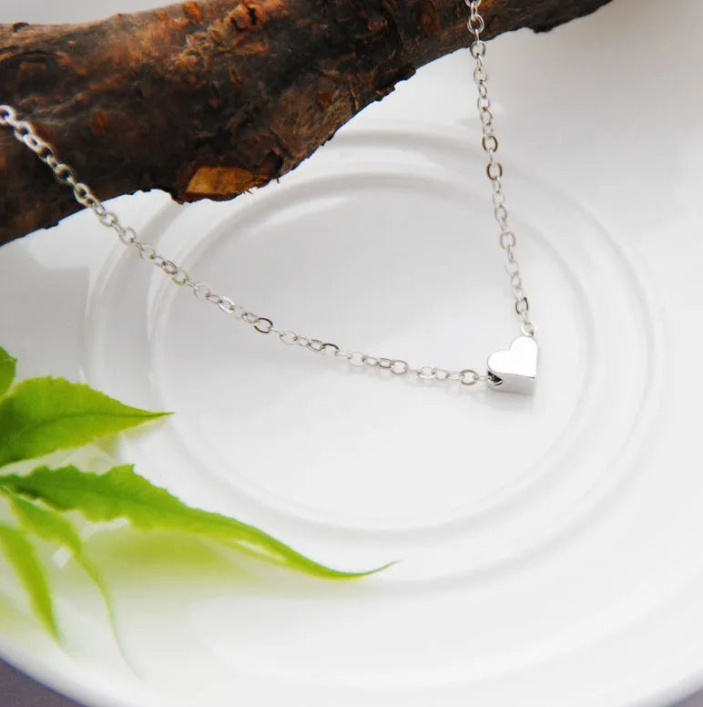 Heart & Soul choker necklace with gold plated heart-shaped alloy pendant on simple chain