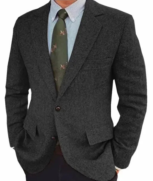 Man wearing a brown herringbone pattern retro-style suit jacket with long sleeves.