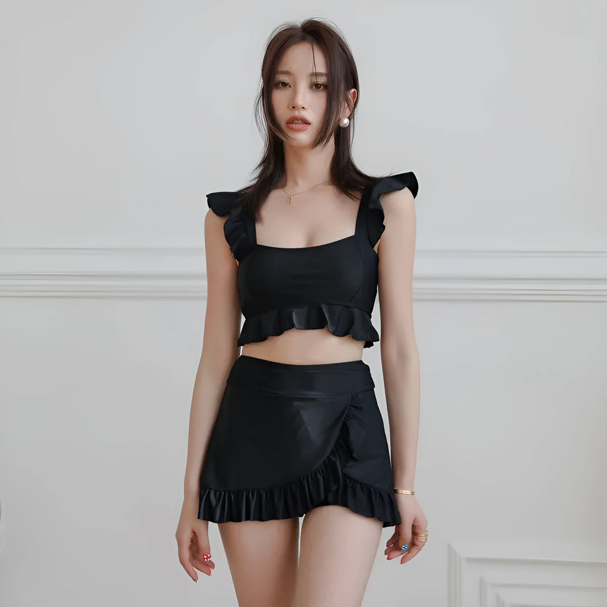 Black nylon women's split swimsuit two-piece bikini set in sizes M, L, and XL