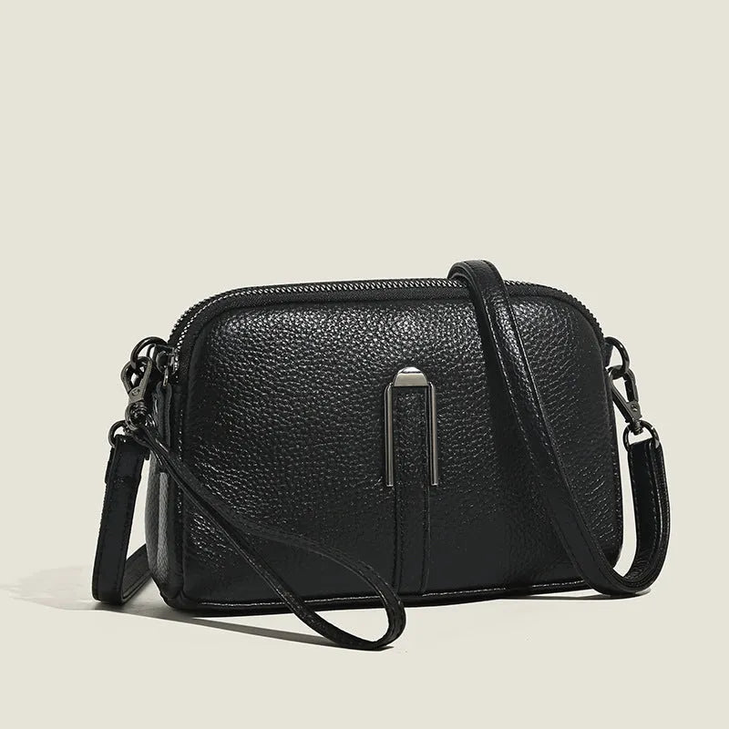 Genuine leather women's shoulder bag in horizontal square shape showing black, navy, green, brown colour options