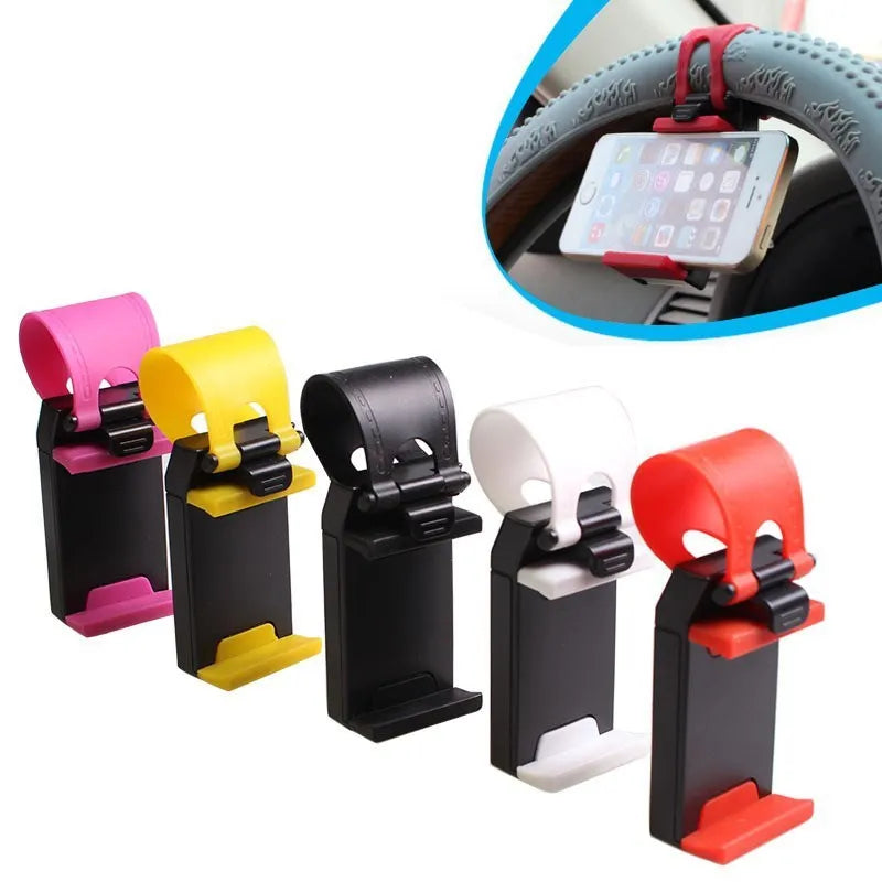 Black steering wheel phone clip mount holding smartphone with soft silicone padding visible