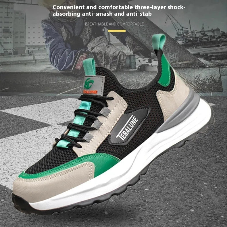 Black and green low-top safety shoes with a mesh upper and plastic steel toe cap on a white background.