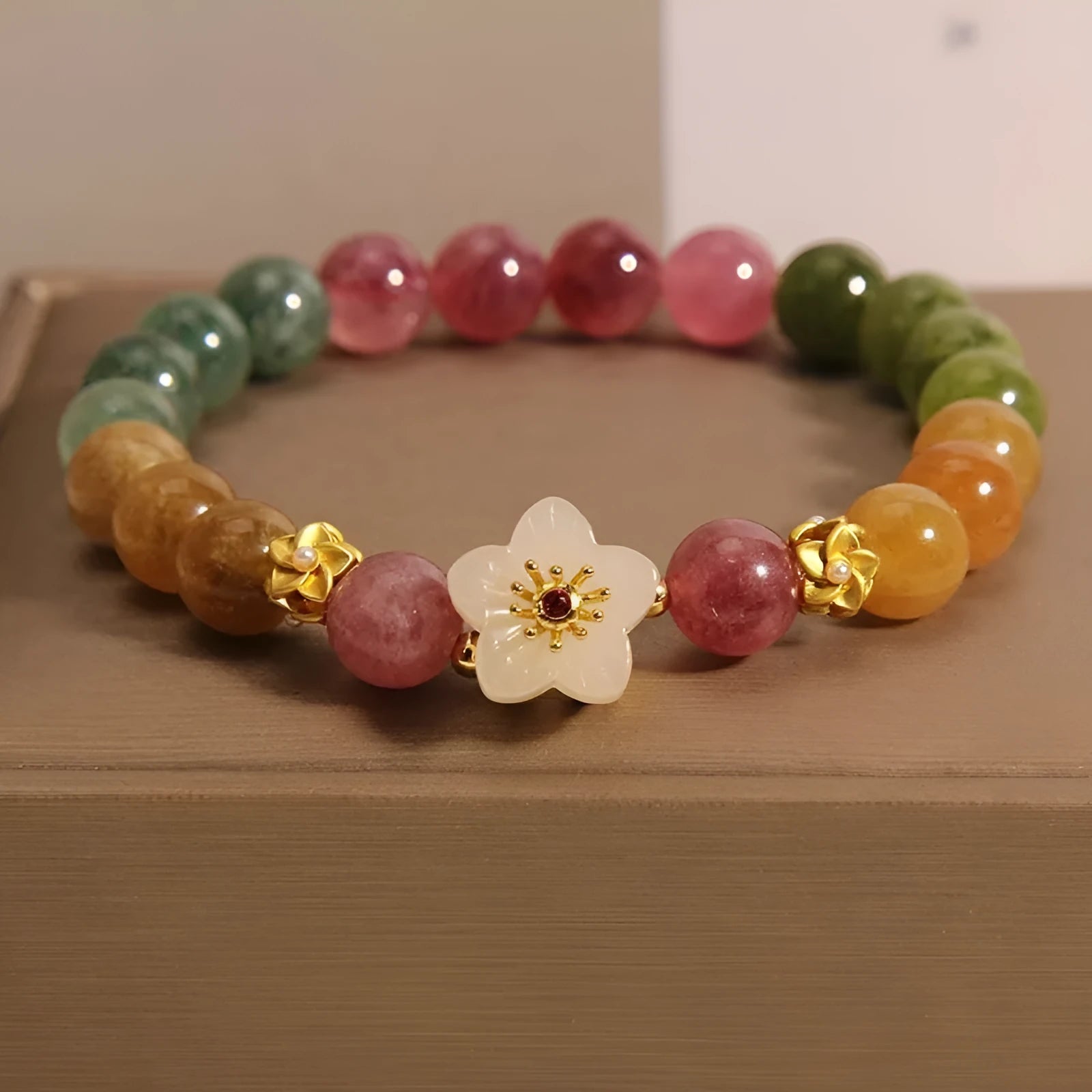 Natural tourmaline geometric bracelet with floral and Chinese fu character designs
