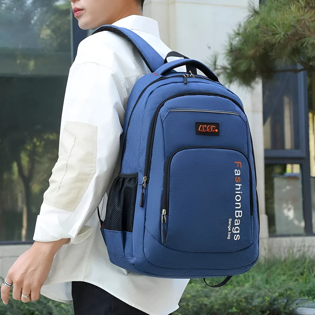Nylon travel backpack in black showing multiple internal compartments including a laptop sleeve and front pockets.