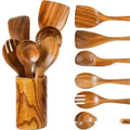 Wooden kitchen utensil set with seven pieces including spoons and spatulas in natural wood finish