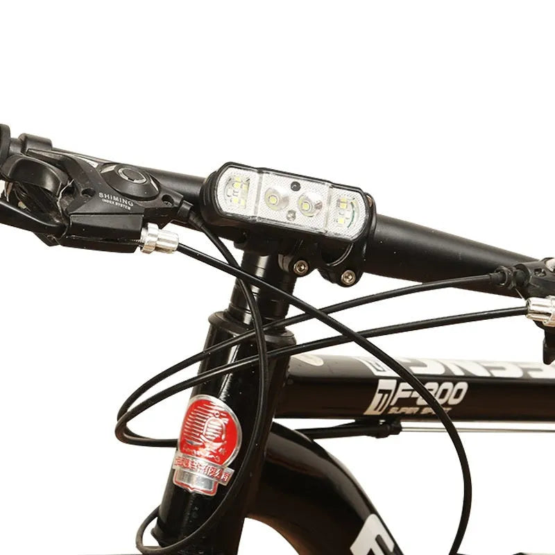 Black rechargeable bicycle headlight with LED illumination and wave induction function