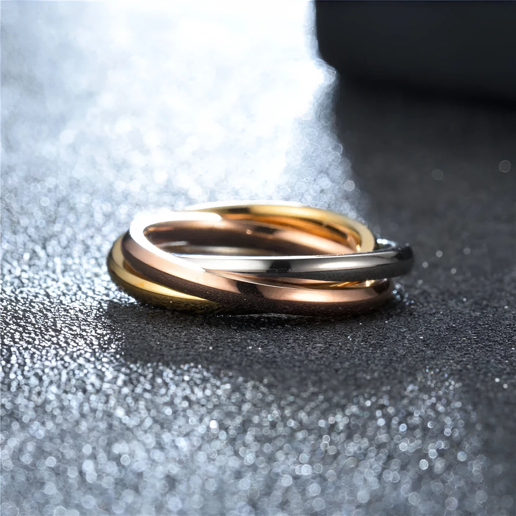 Stainless steel tricolour three-ring in gold, rose gold and silver, plain circle unisex design, sizes 5 to 10
