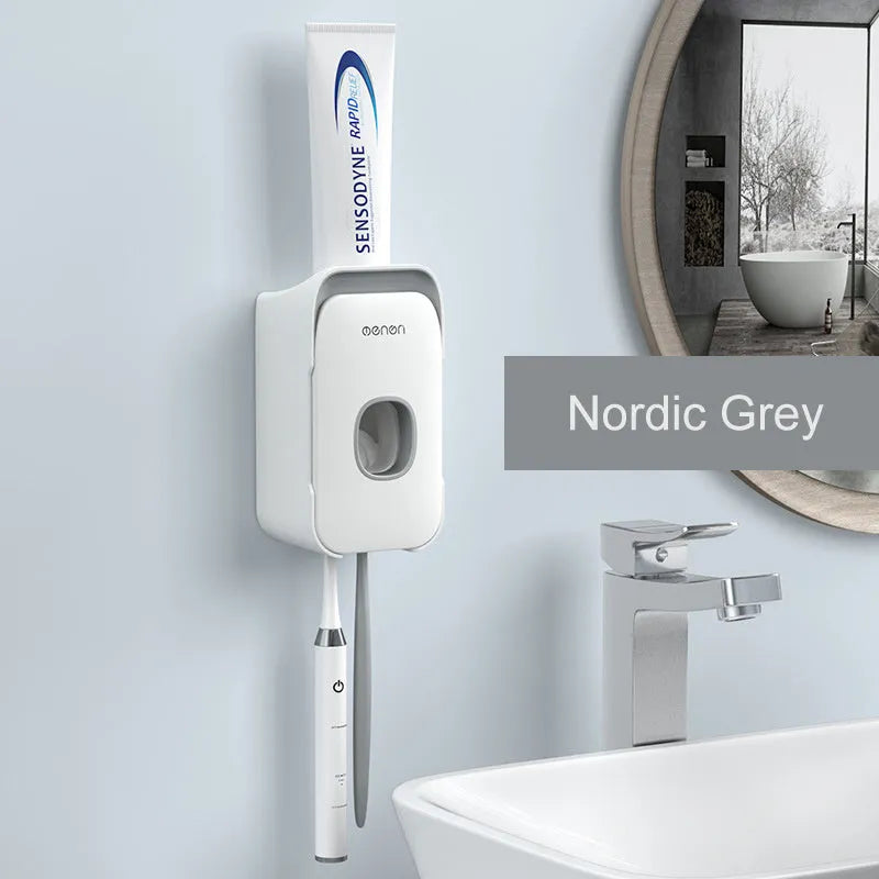 Automatic toothpaste dispenser in blue colour mounted on bathroom wall