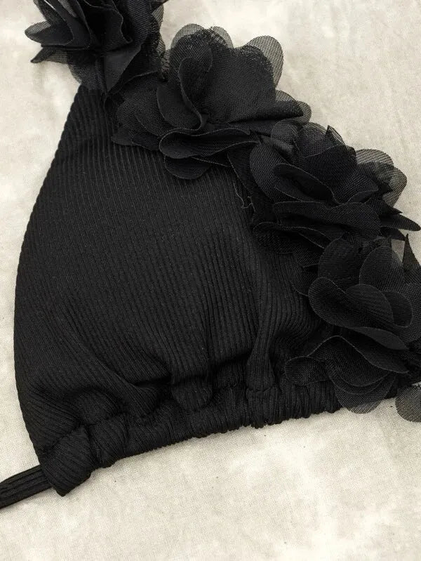 Han black women's two-piece polyester bikini set with gathered design.