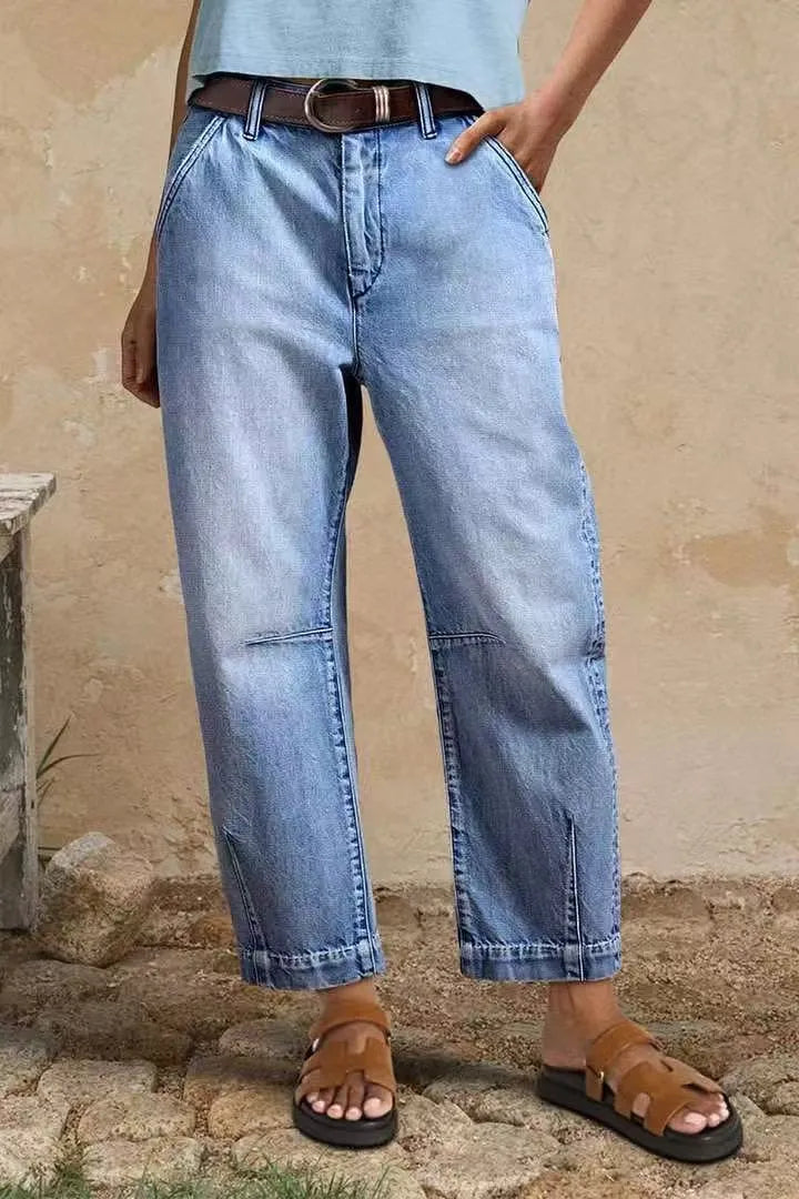 Casual cotton denim loose jeans trousers in light blue with washed finish, street hipster style