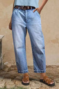Casual cotton denim loose jeans trousers in light blue with washed finish, street hipster style