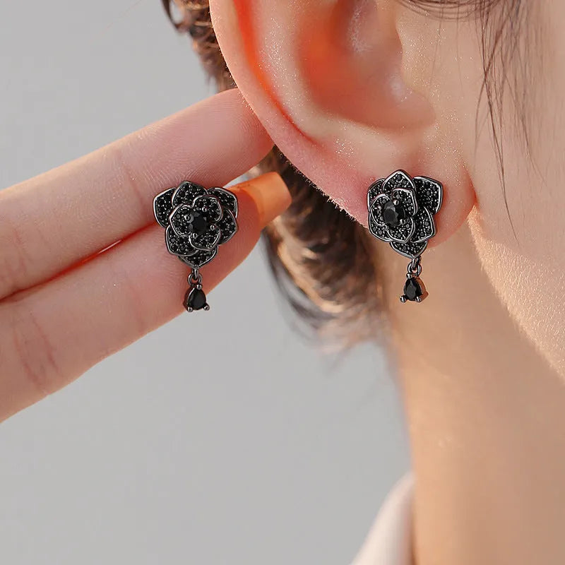 Black rose stud earrings with floral zircon design and gold-coloured electroplating