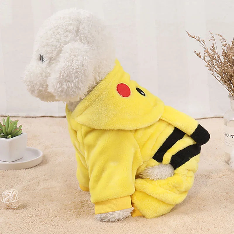 A small dog or cat wearing a soft fleece hoodie coat in a cosplay style.