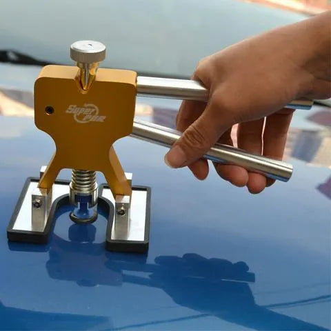 Car dent repair tool set with gold puller, 23 rubber tabs, hot glue gun and glue sticks