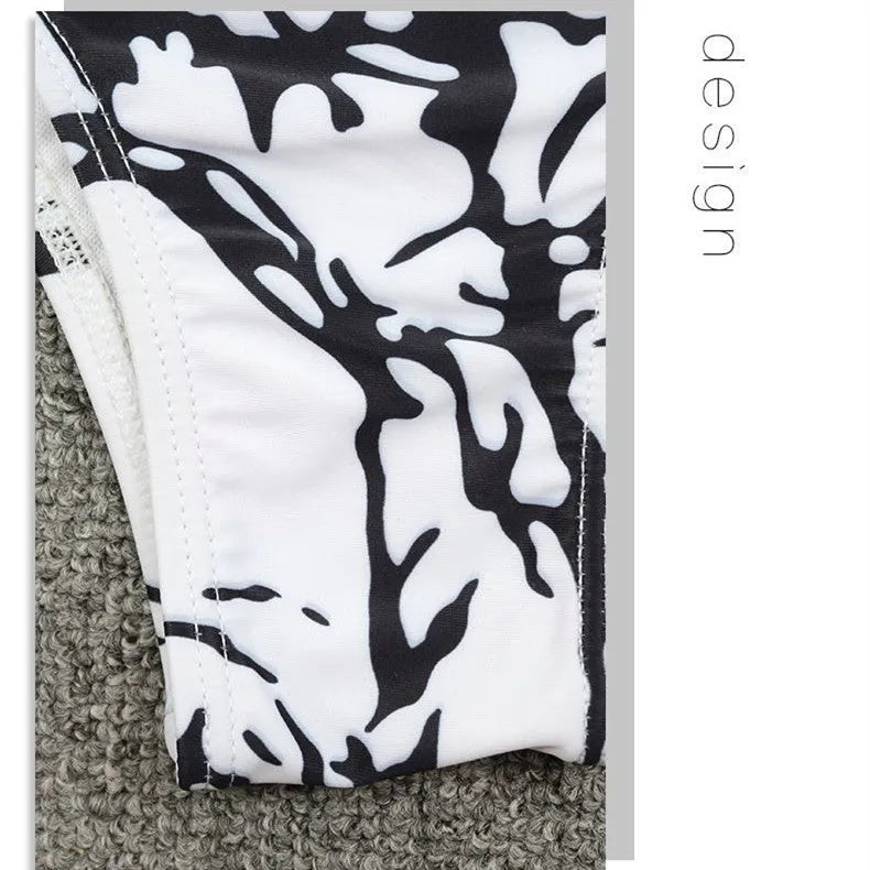 Ladies two-piece bikini set in black and white tie dye with chest pad, sizes S M L