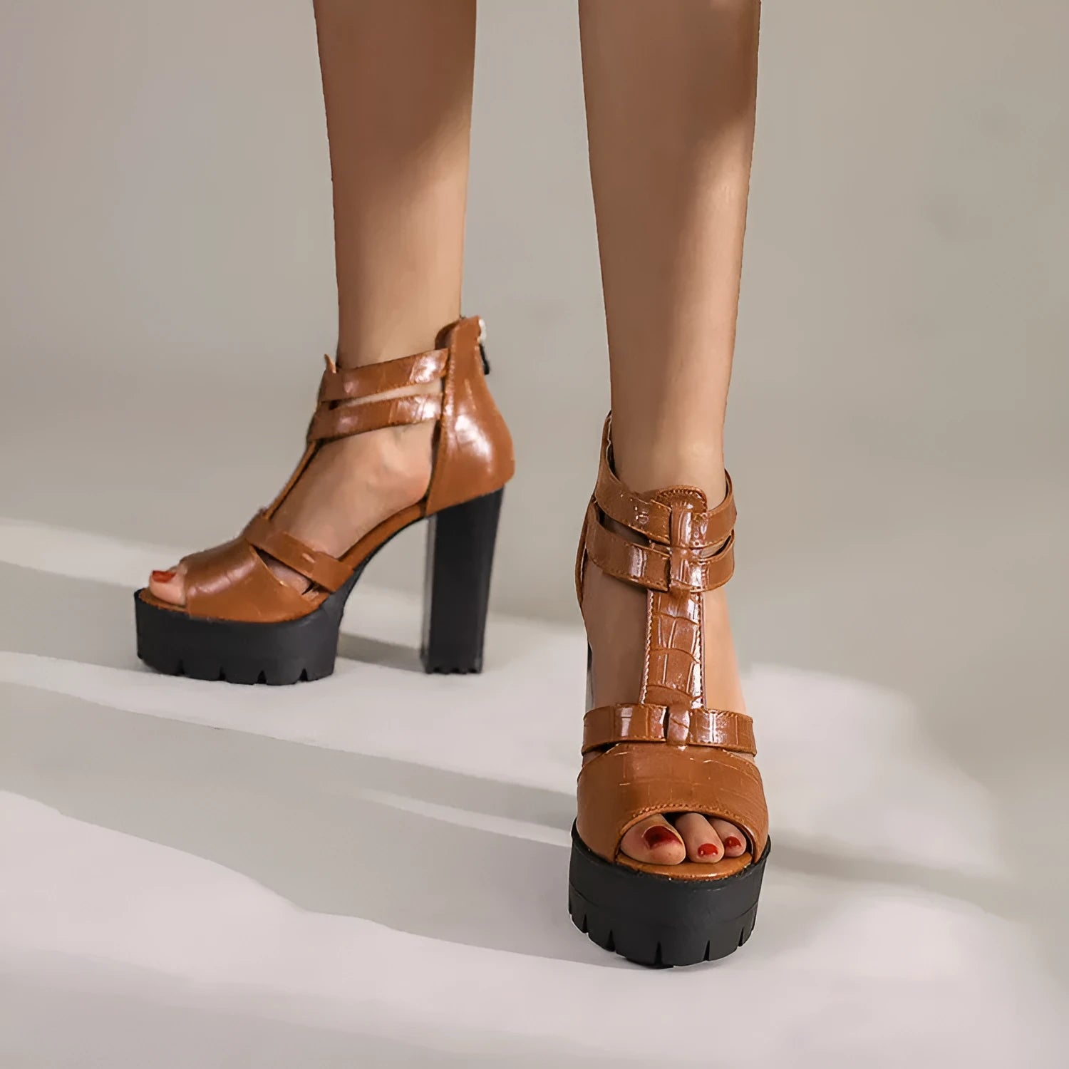 Women's black PU platform high heel sandals with a back zipper and round toe.