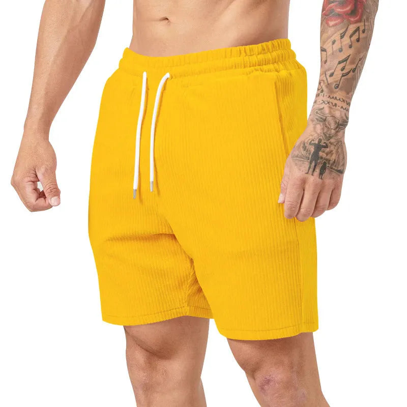 Men's simple casual shorts in chemical fibre blend, straight leg, available in black, yellow, army green, apricot, and brown