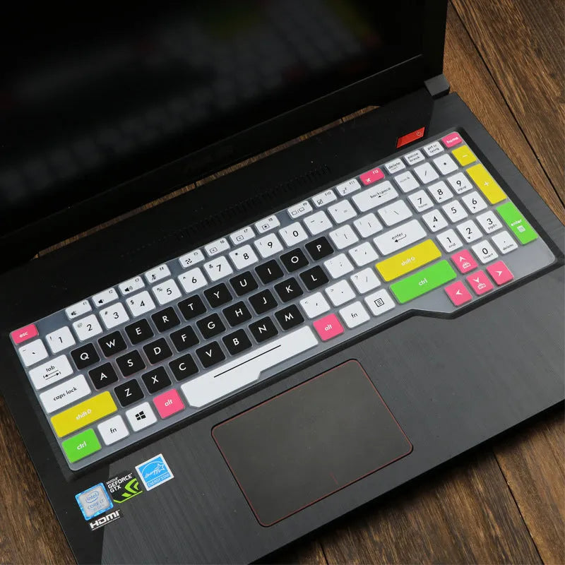 ASUS Flight laptop keyboard protective film cover in multiple colour options showing translucent and gradient designs