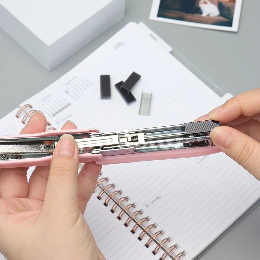Box of 1000 metal staples in rose gold, black, purple, and rose red colours for office staplers