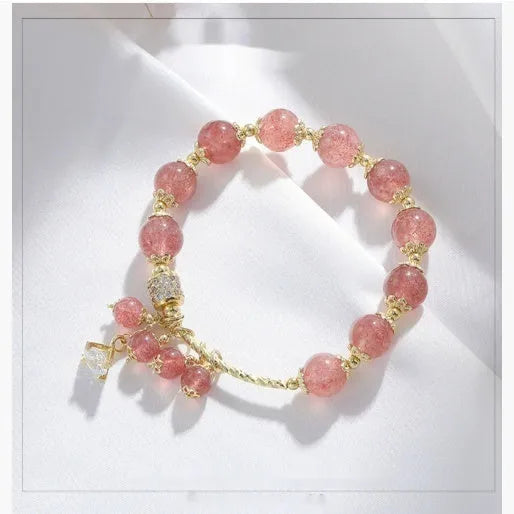 Pink strawberry quartz crystal bracelet with heart shapes and pearl accents for women