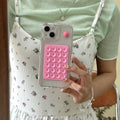 Silicone phone case with suction cup for iPhone 15 Pro Max in black showing back and edge coverage