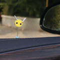 Small yellow and black fur ball bee car decoration ornament measuring 3cm.