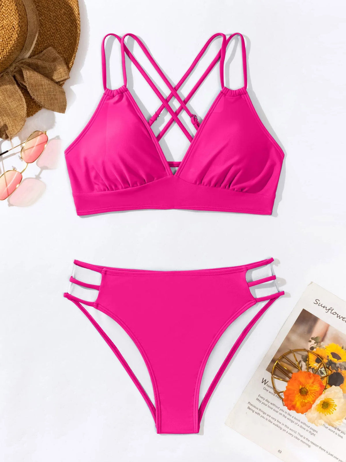 Adult women's black V-neck halter bikini with split-leg high-cut shorts.