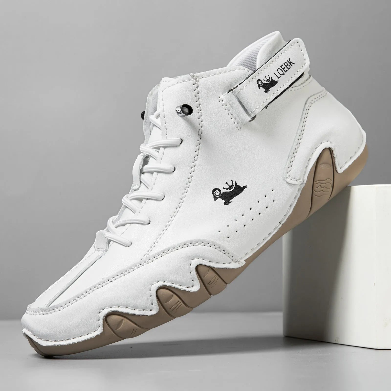 Men's brown high-top Martin boots with round toe and flat rubber sole on a white background.