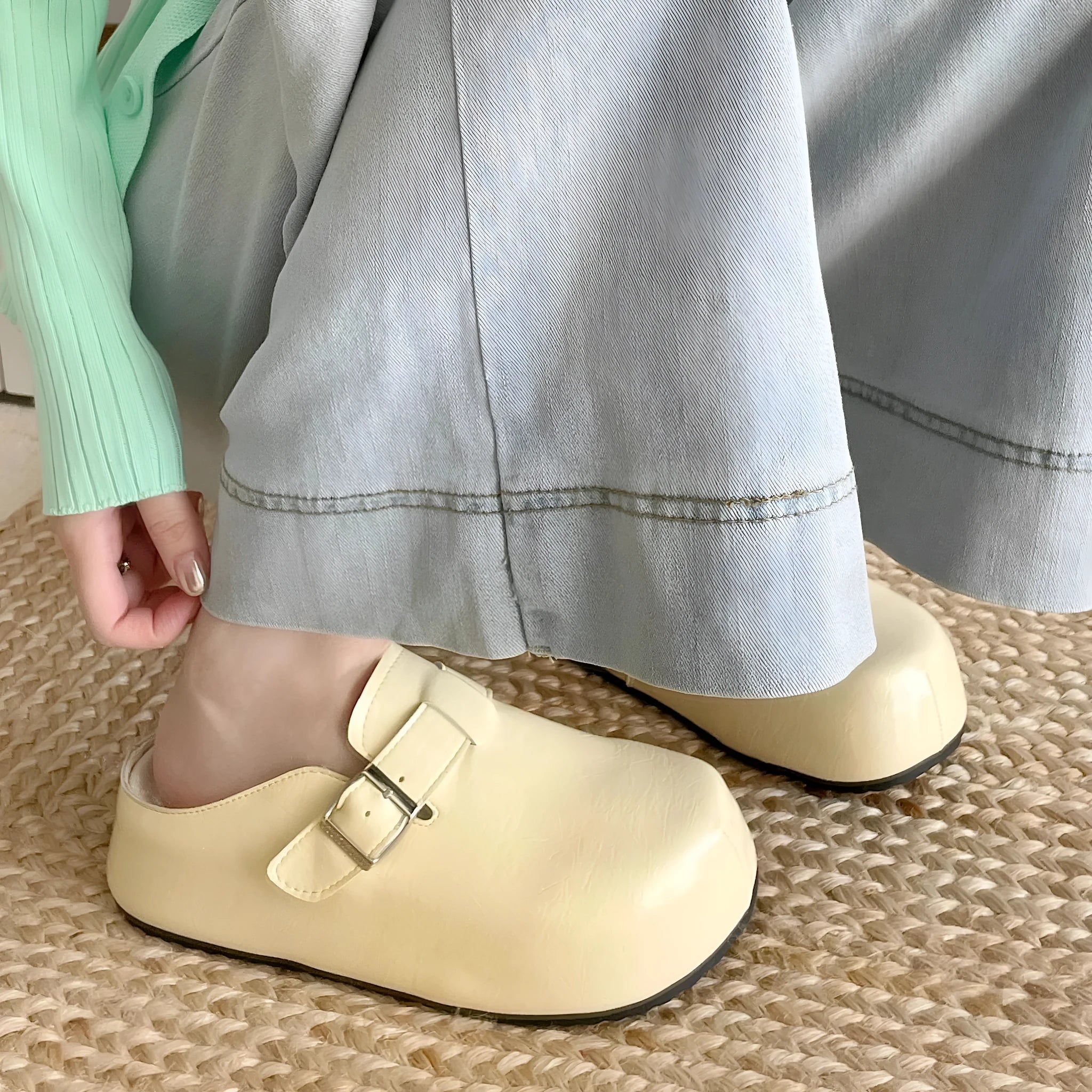 Flat buckle casual sneakers in yellow with a round toe and PU upper.