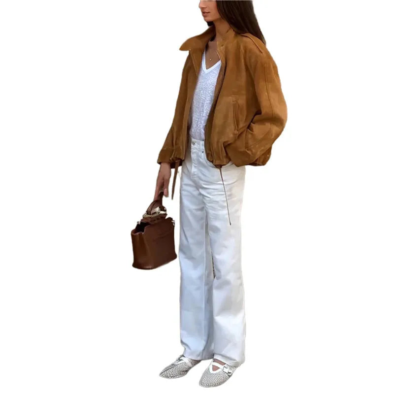 Loose fit solid colour retro jacket with long sleeves on mannequin
