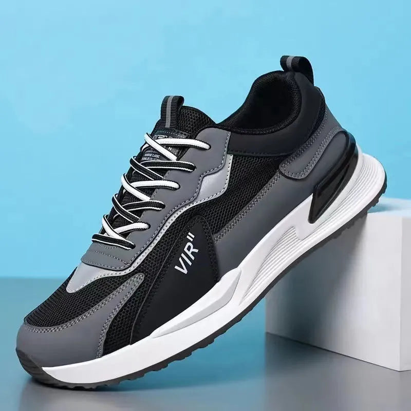 Men's colour block mesh sneakers in black, grey, or white with lace-up design and round toe.