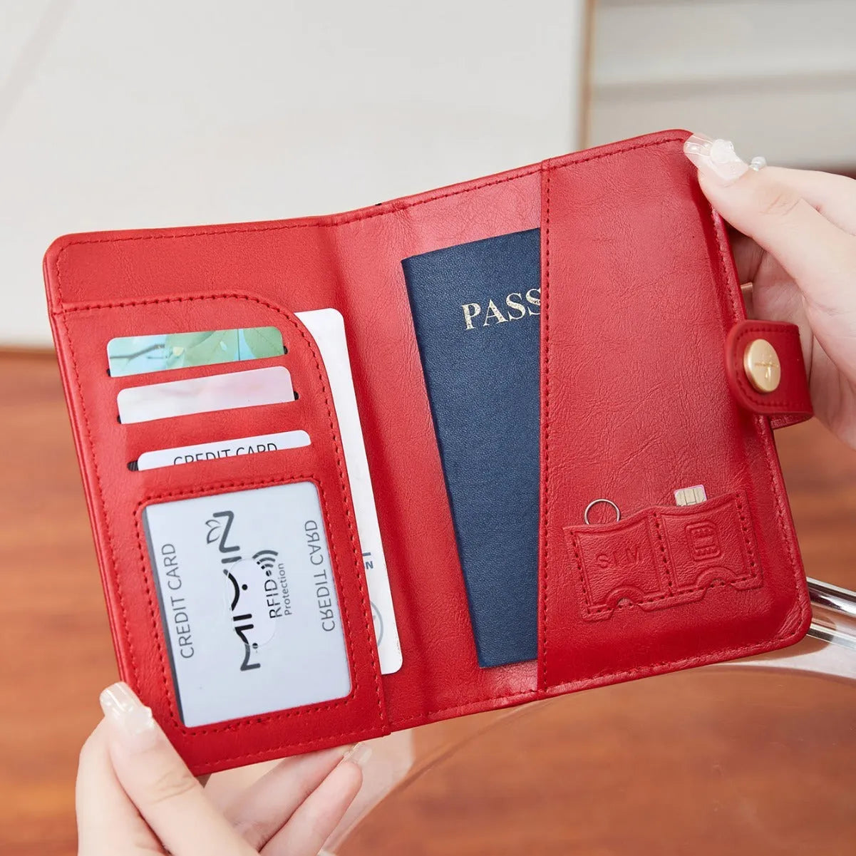 Women's PU passport holder with aircraft pattern design in multiple colour options showing organised document storage compartments