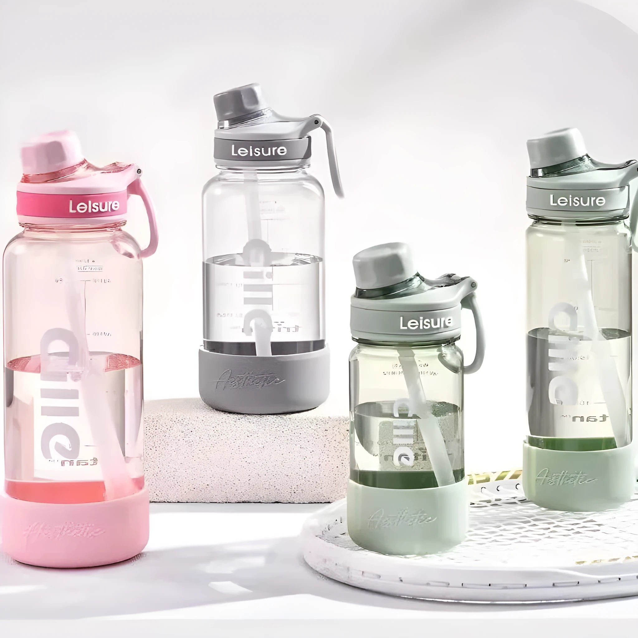Plastic straw cup with cartoon pattern in grey, green, or pink colour, available in 520ml, 780ml, and 1000ml sizes